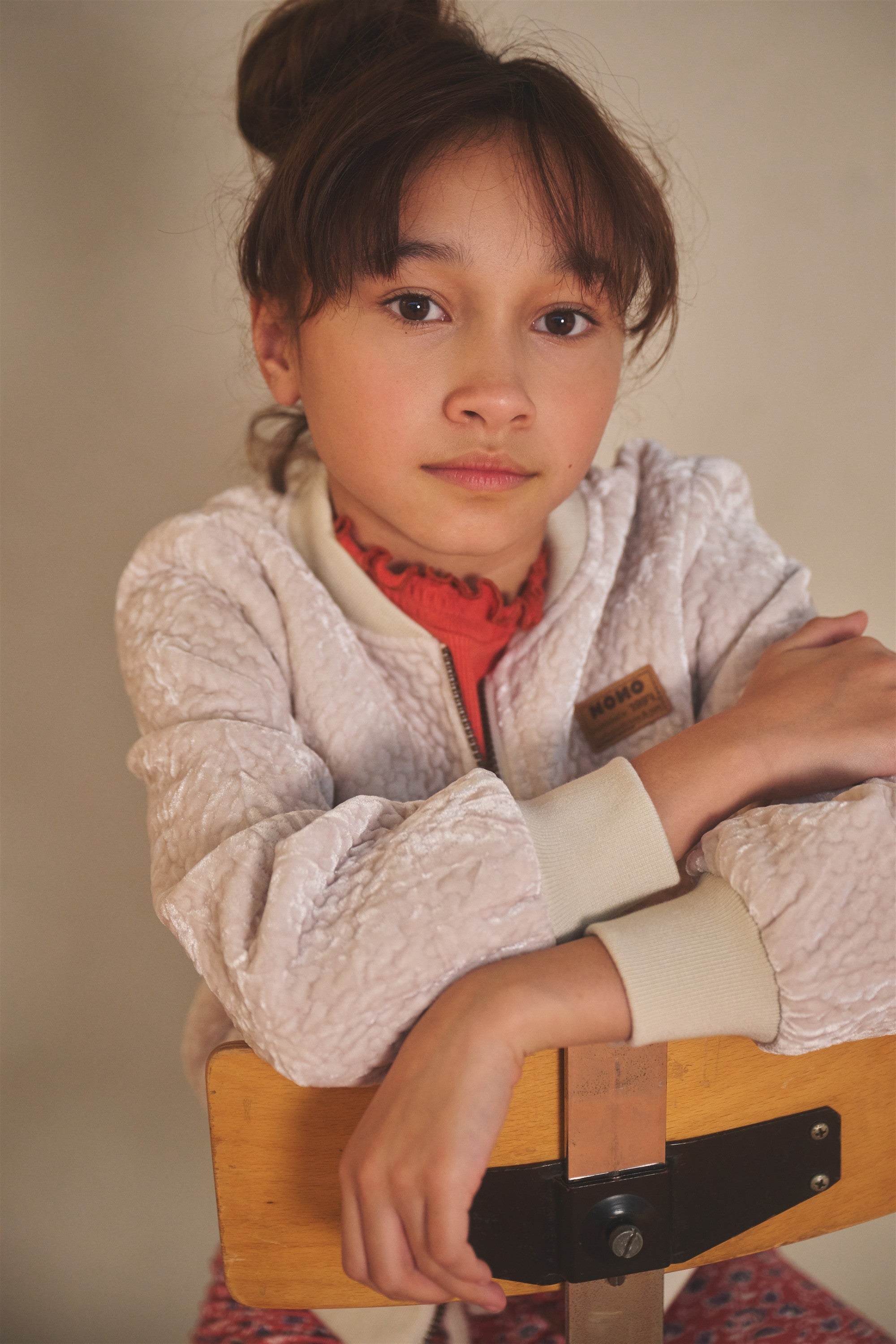 NoNo Doris binnen Jas Ivoor